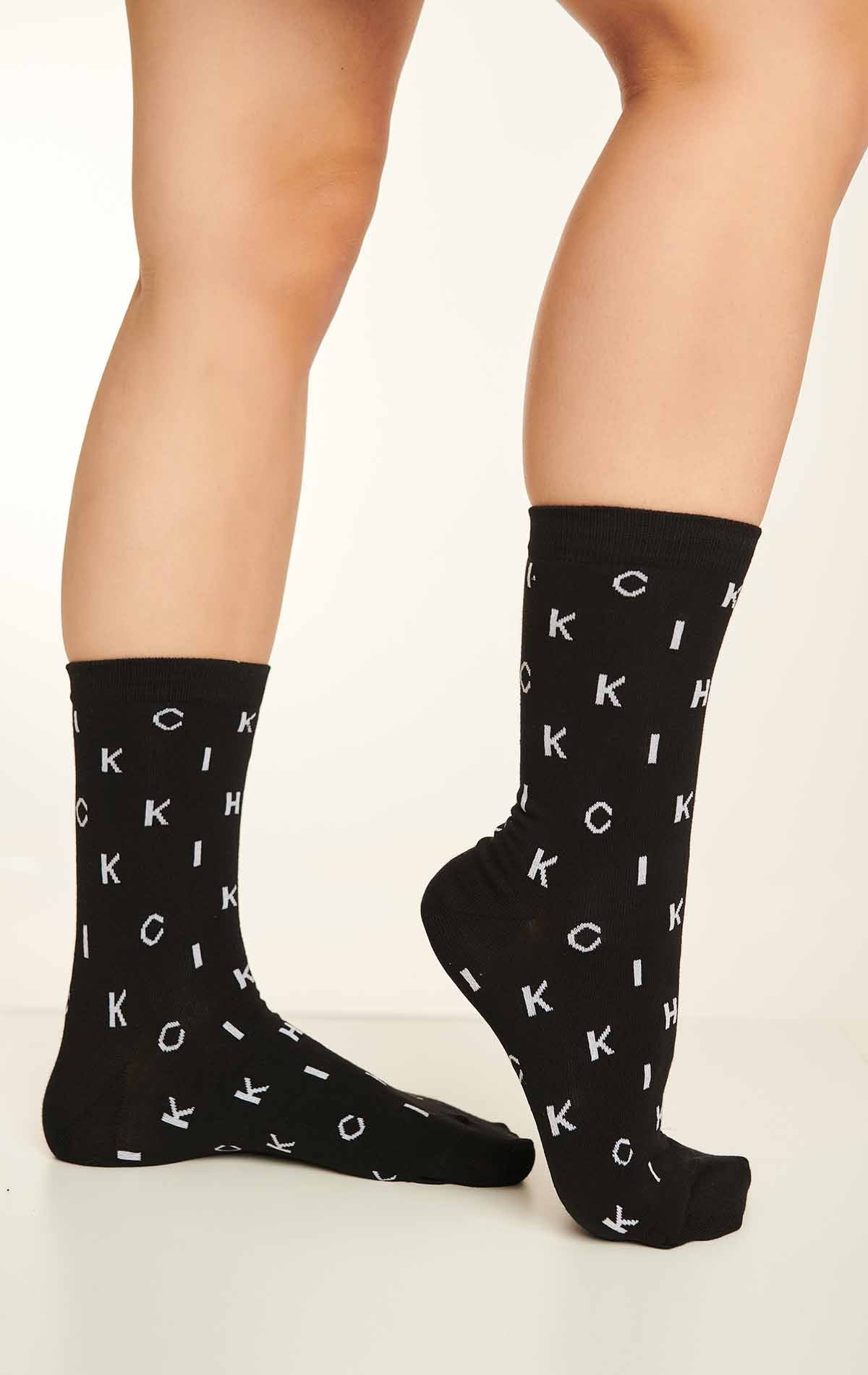 SUPREME ANAGRAMM SOCKEN SCHWARZ