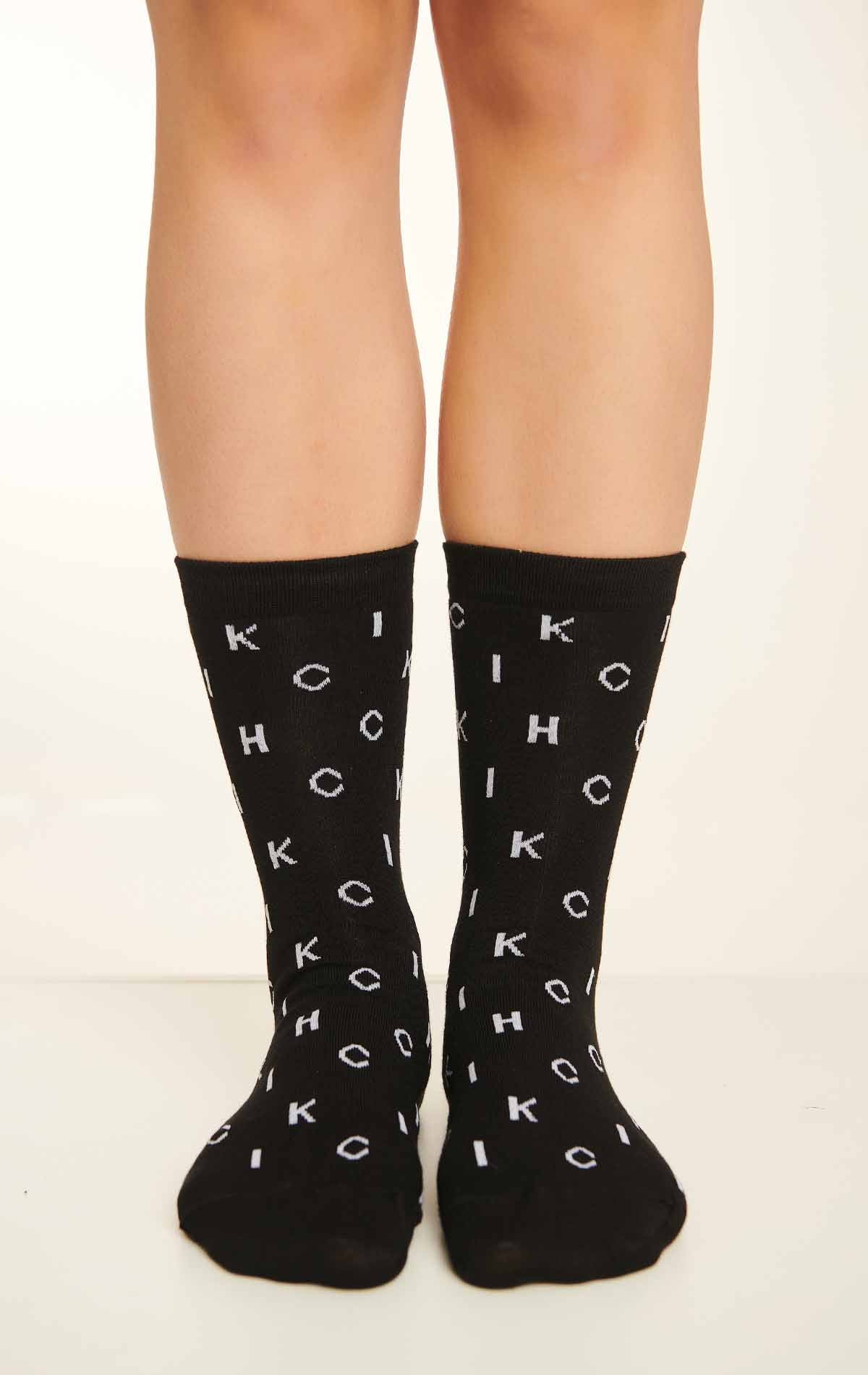 SUPREME ANAGRAMM SOCKEN SCHWARZ